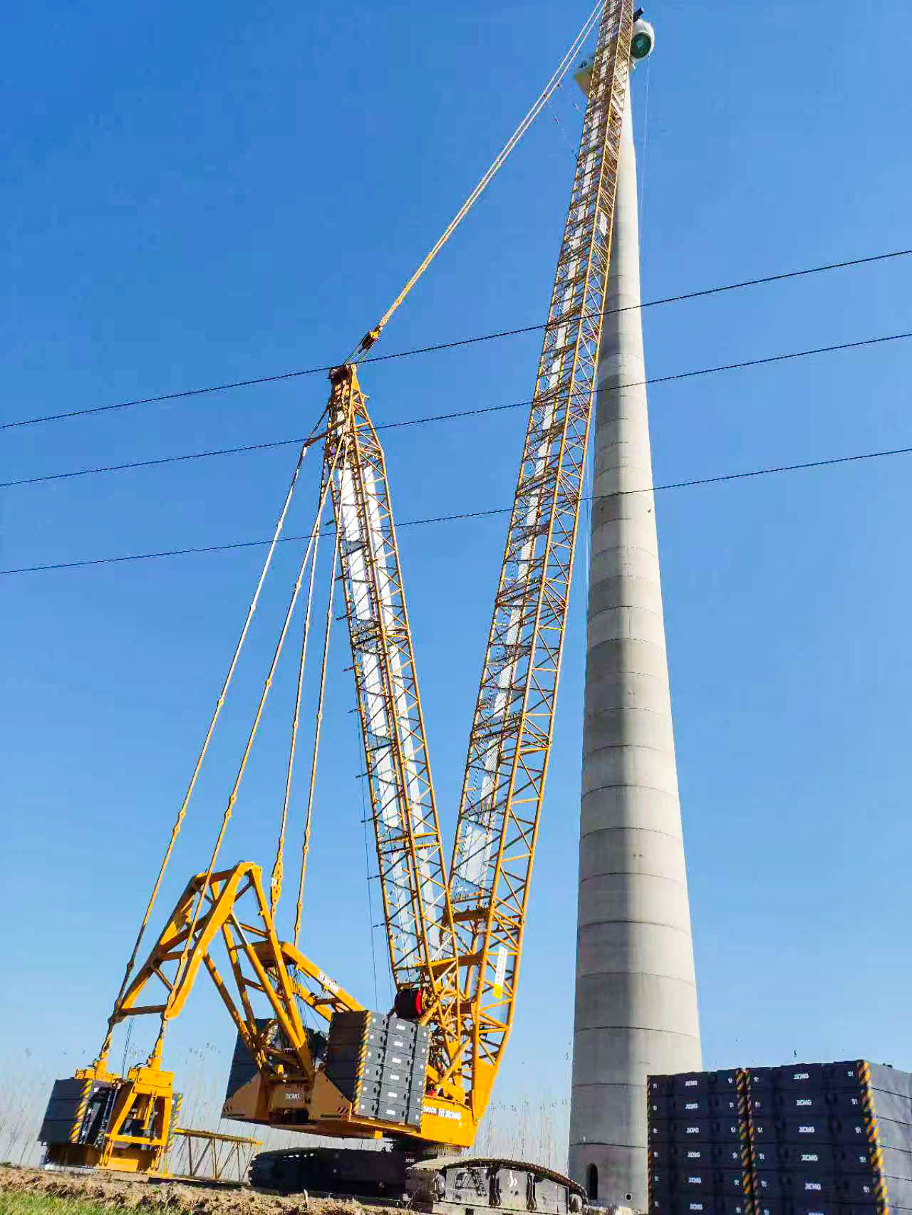 160米高空精准“搭积木”：w66利来XLC15000M分体吊装6.25兆瓦风机全纪录